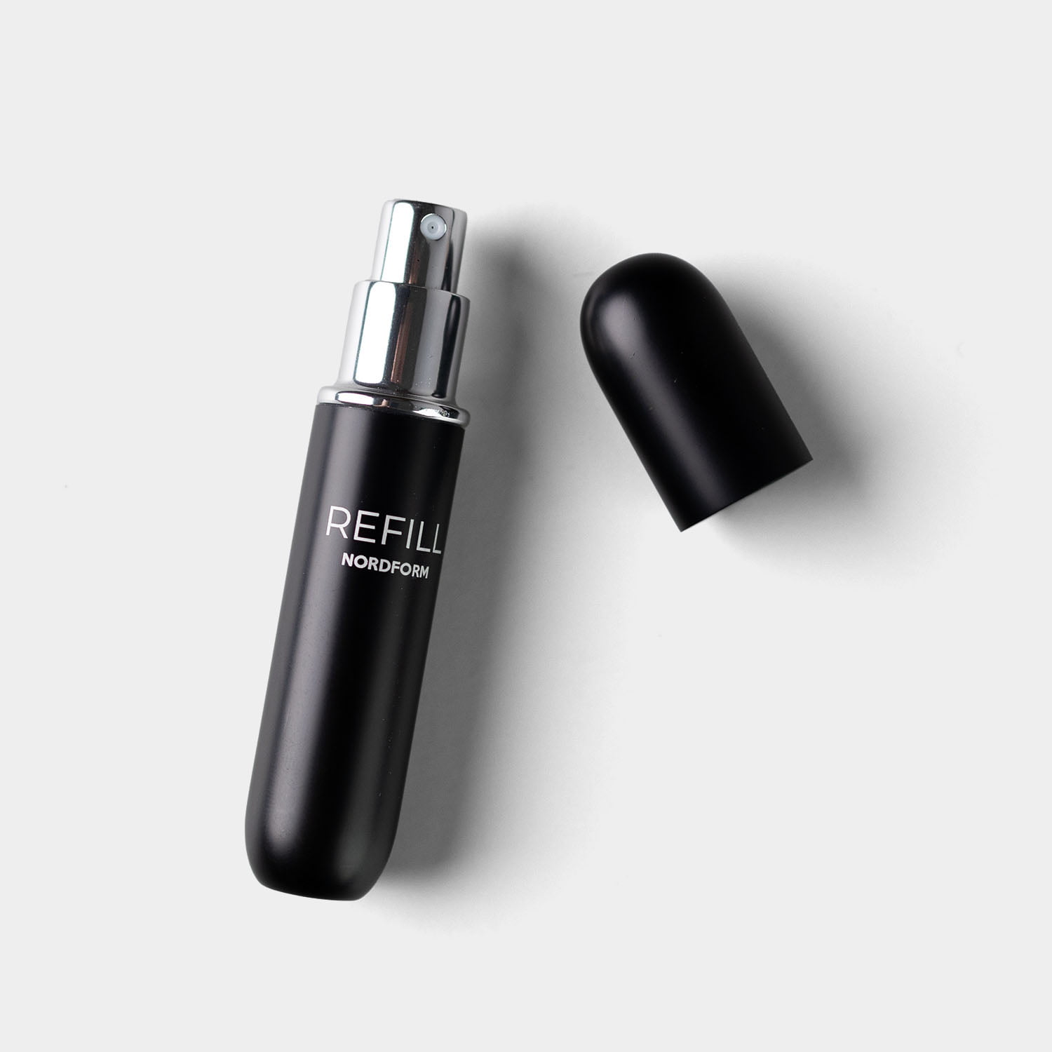 Perfume atomizer front